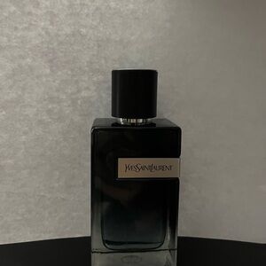Yves Saint Laurent Elegant Black Glass Bottle